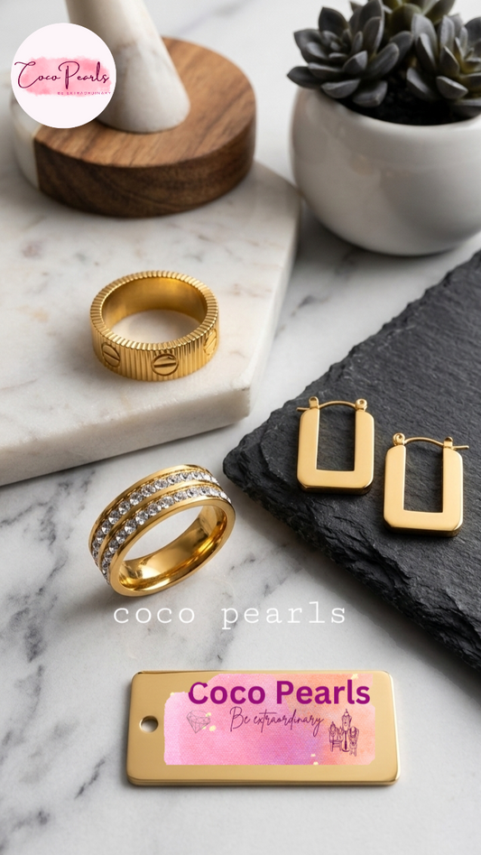 coco pearls stainless steel anti tarnish golden studs and rings displayed on light background