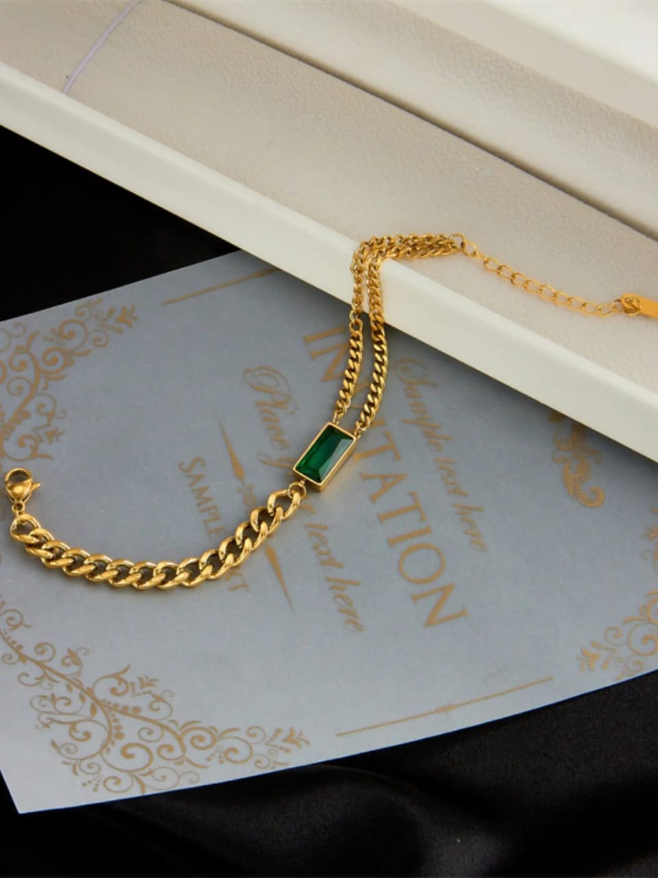 Coco Pearls Stainless Steel Anti Tarnish Gold emerald trio bracelet with a green stone on an elegant card