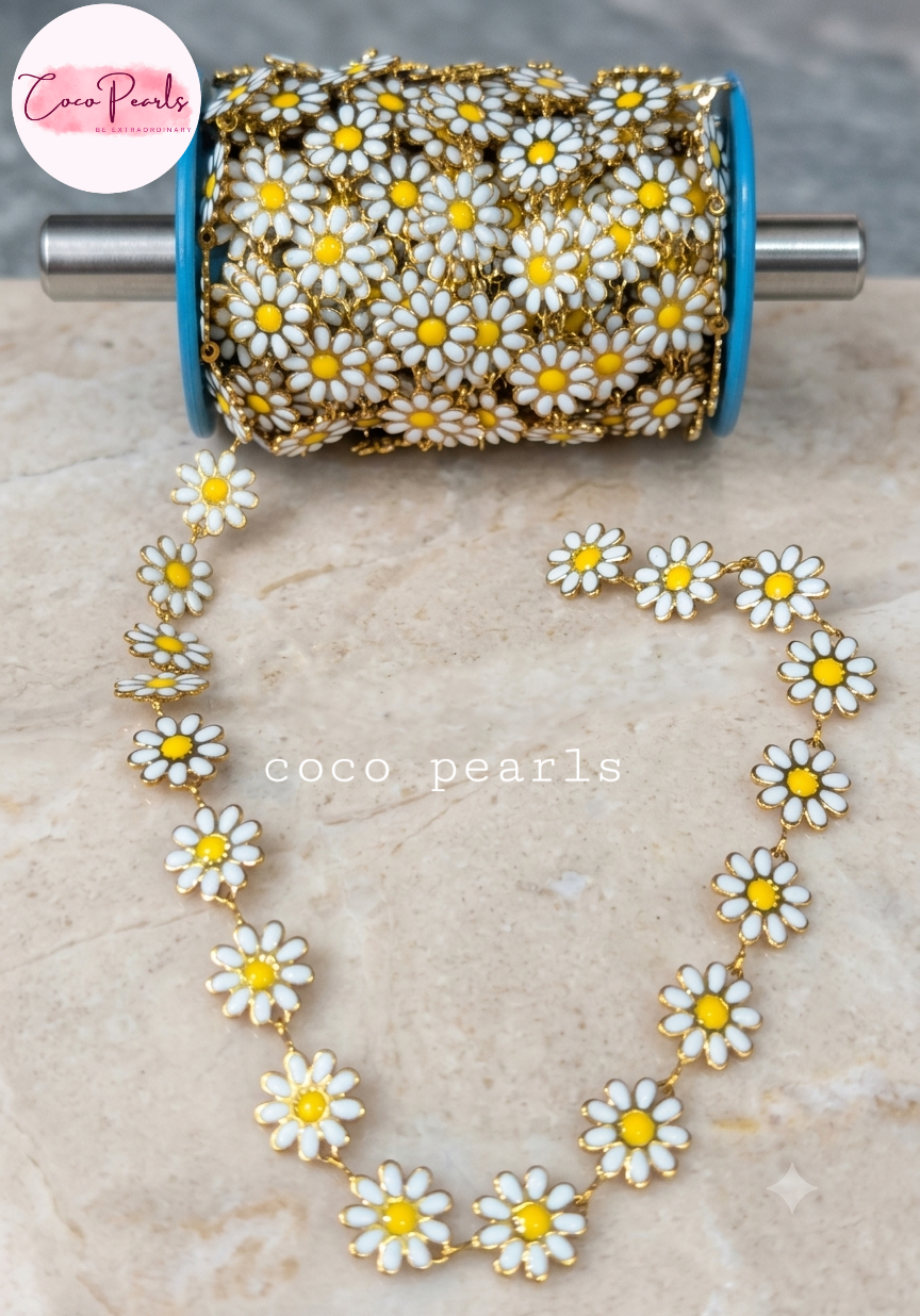 Coco pearls stainless Steel anti tarnish gold design white and yellow daisy flowers displayed on simple background