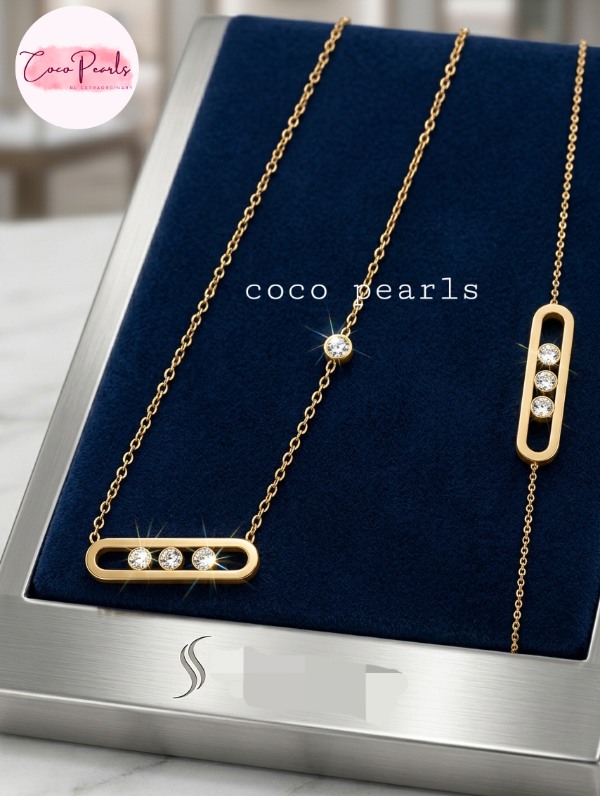 Gold necklace and bracelet with diamond accents on a blue cushion