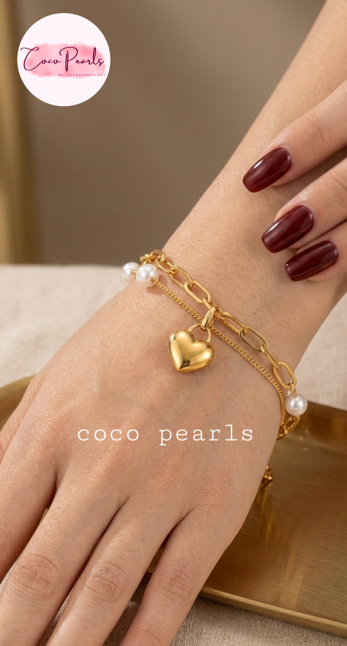 Coco Peals Stainless Steel anti tarnish Gold morning dew chain bracelet with heart charm and pearls on a hand