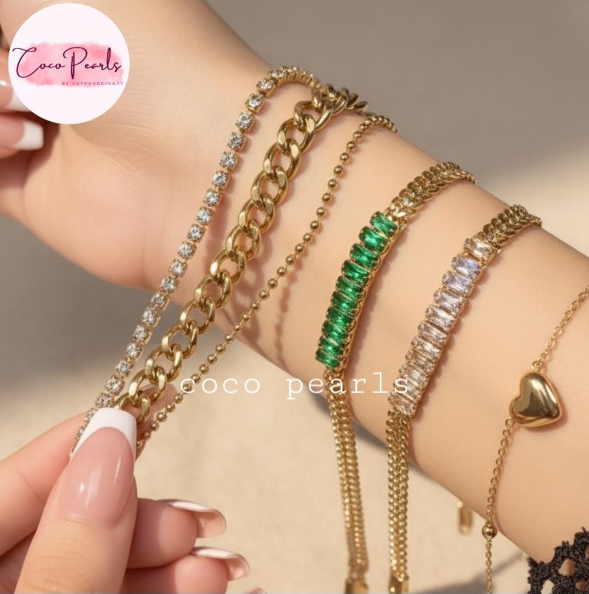 Coco Pearls Stainless steel Anti Tarnish Gold bracelets with different bracelets stacked on a wrist