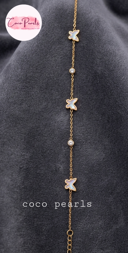 Coco Pearls Stainless Steel Anti Tarnish golden butterfly link bracelet with black butterflies and clear stones