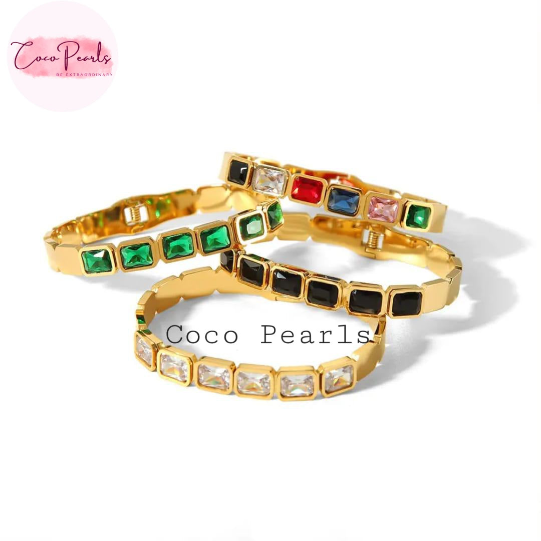 Coco Pearls Stainless Steel Anti Tarnish Gold crystal glam handcuff bangle bracelets with gemstones in black, green and clear color on a white background