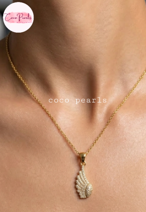 coco pearls stainless steel pakistan anti tarnish waterproof Gold diamond wing necklace with diamond studded wing pendant on neck