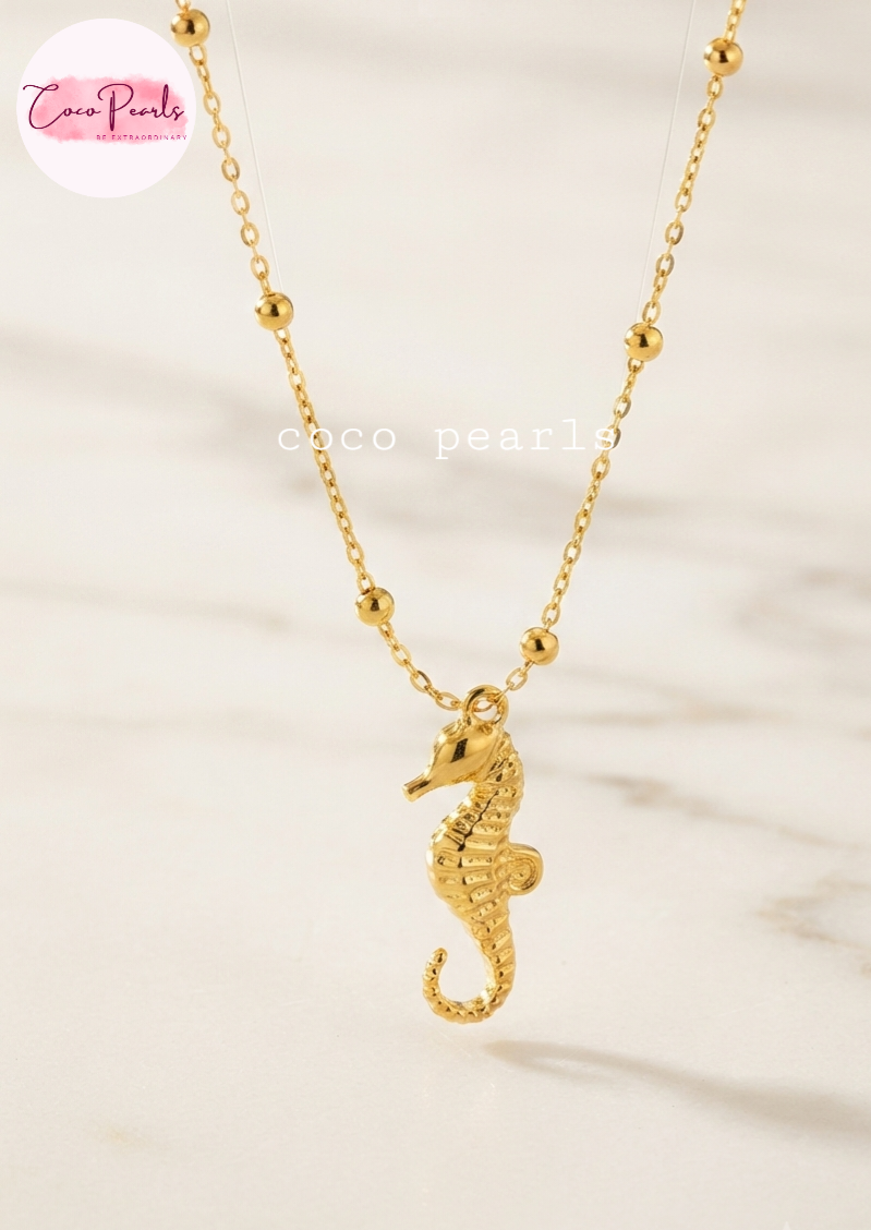 coco pearls stainless steel gold ball chain displayed as necklace with charm