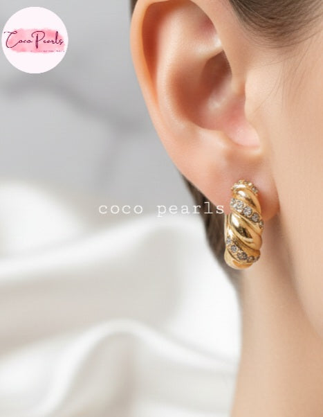 Coco Pearls Stainless Steel Golden whirl hoop croissant shaped earrings with rhinestones on ear