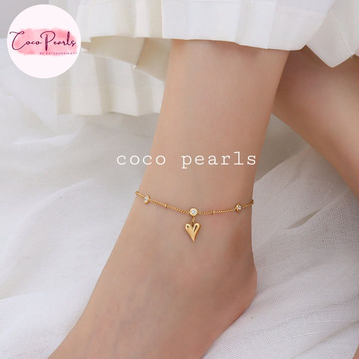 Coco Pearls Stainless Steel Anti Tarnish Gold heartbeat anklet with heart charm on a foot