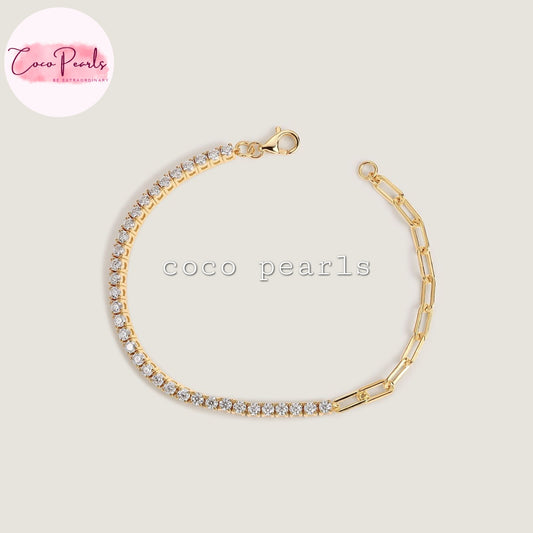 Coxo pearls stainless Steel anti tarnish Gold bracelet with clear stones on a light beige background