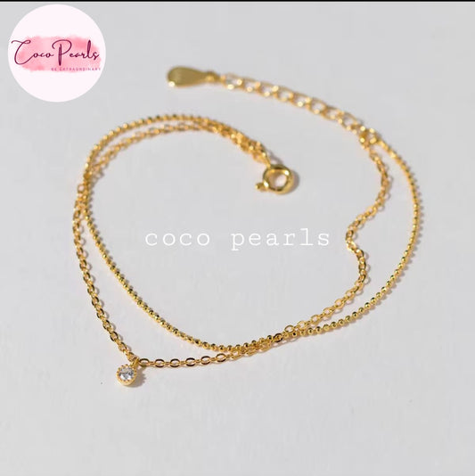 Coco Pearls Stainless Steel Anti Tarnish Gold twinkle duo anklet double chain and a small diamond hanging
