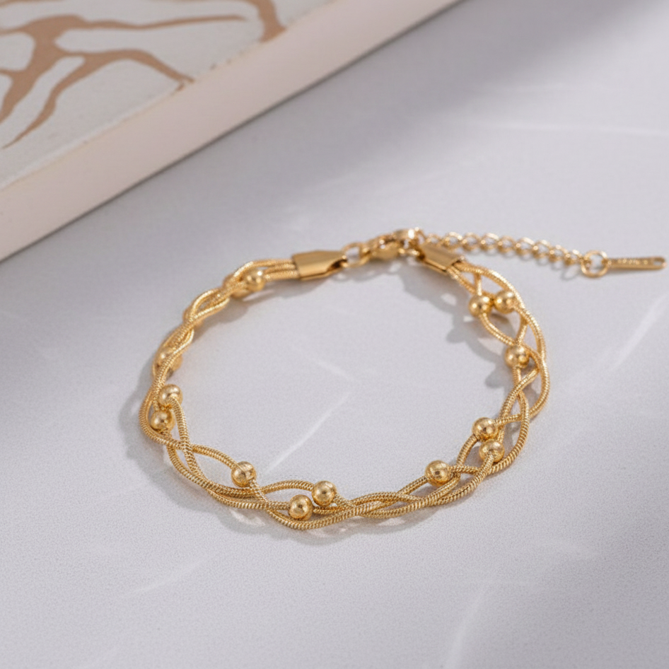 coco pearls stainless steel anti tarnish gold twisted braid bracelet with 3 ball chains twisted in a braid