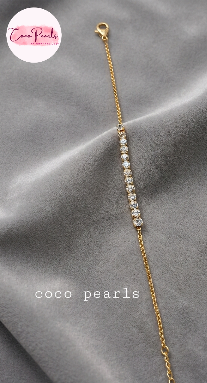 Coco Pearls Stainless steel anti tarnish Gold 13 stars bracelet with 13 diamonds on light background 