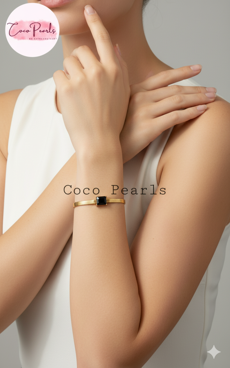 Coco Pearls Stainless Steel Anti Tarnish Gold black accent bracelet on wrist 