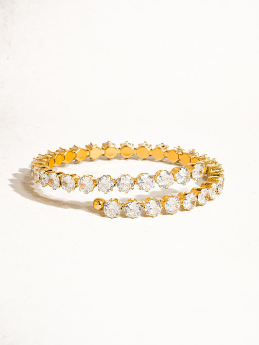 Coco pearls stainless Steel anti tarnish Gold bracelet with clear stones on a white background