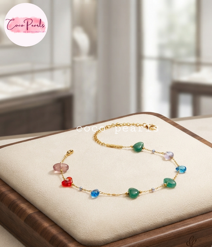 Coco pearls stainless Steel anti tarnish delicate multi stone chain displayed on simple background 