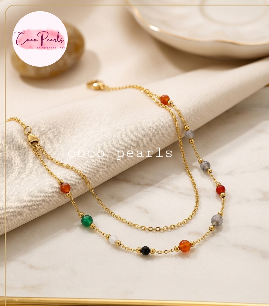 Coco pearls stainless Steel anti tarnish gold boho gemstone bracelet with colorful beads displayed on simple background 