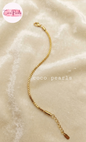Coco pearls stainless Steel anti tarnish gold chain bracelet with a lobster clasp and extension chain, displayed on a soft beige fabric background.