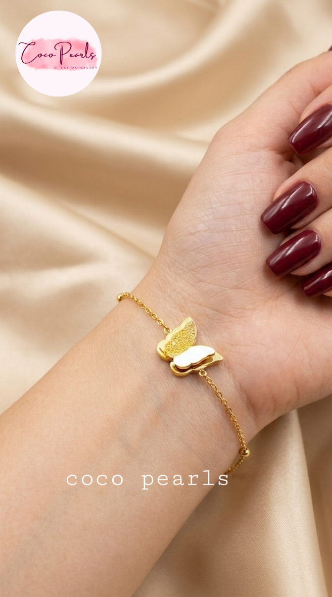 Coco Pearls Stainless Steel Anti Tarnish Gold butterfly whisper bracelet with heart charm on hand