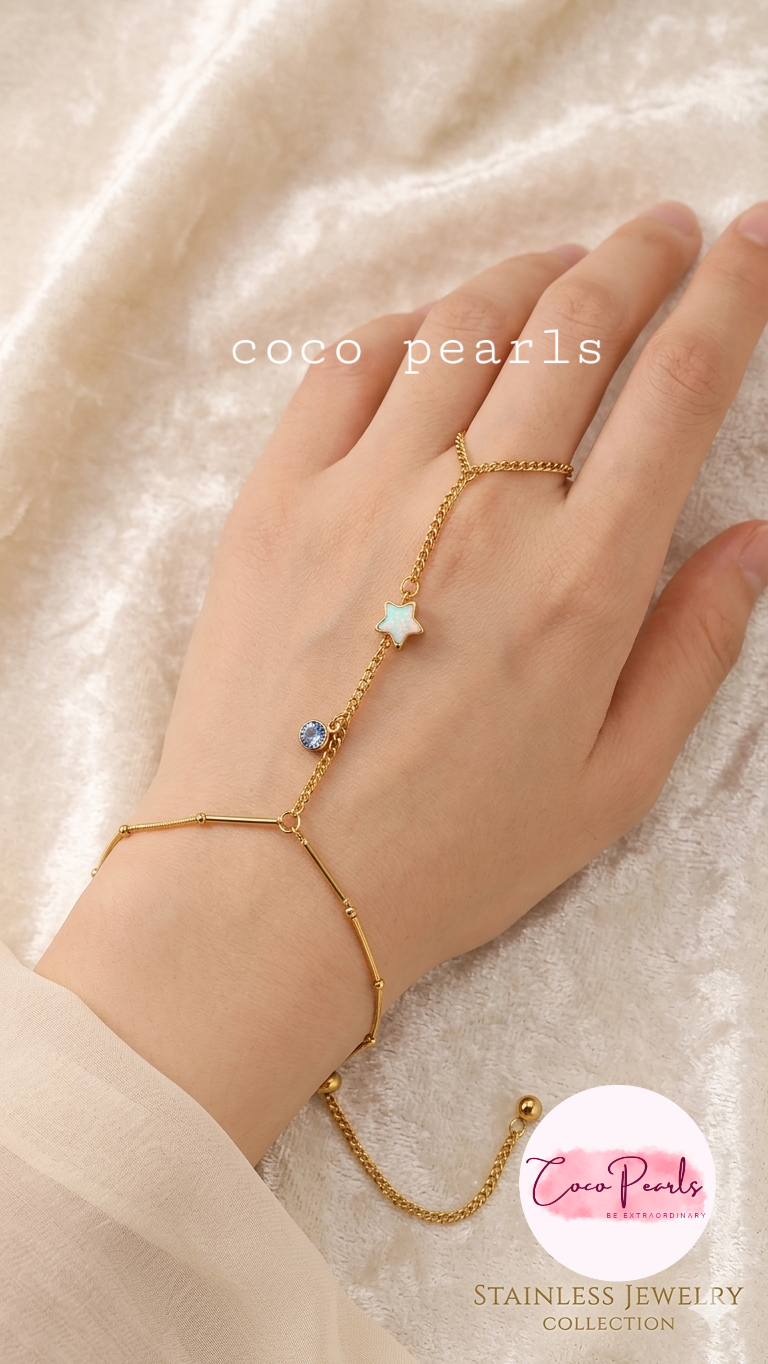 Coco pearls stainless Steel anti tarnish gold  celestial hand harness wirh ring displayed on hand 