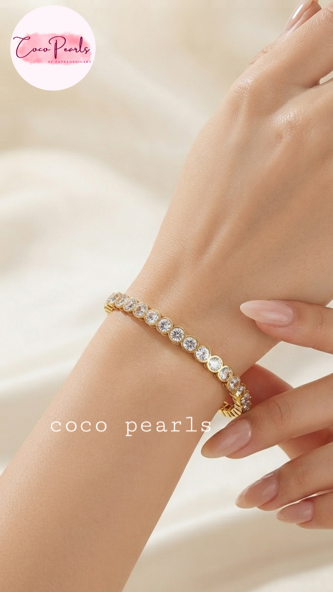 Coco pearls stainless Steel anti tarnish diamond studded handcuff displayed on hand 