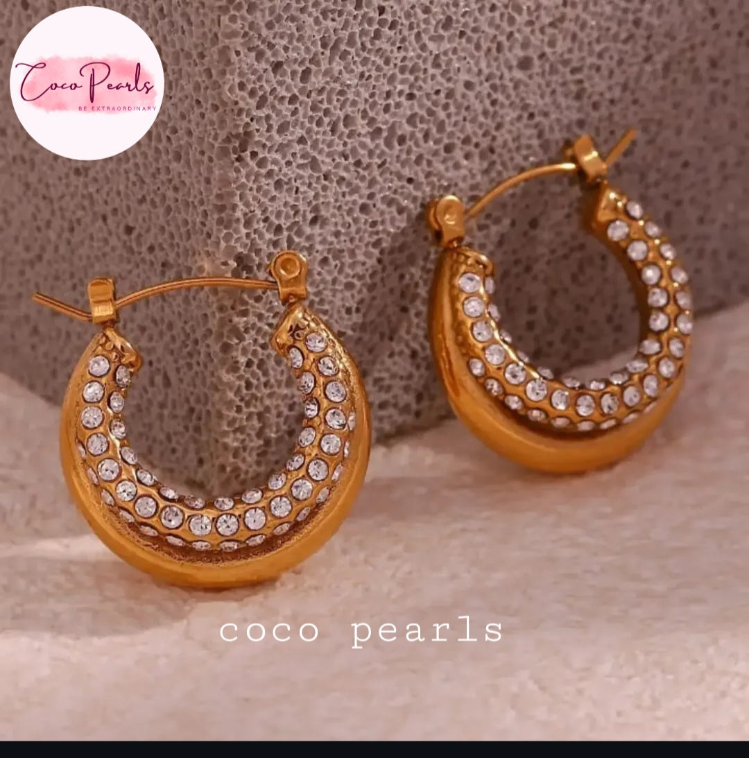 Coco pearls stainless Steel anti tarnish pair of gold crescent-shaped hoop earrings adorned with clear rhinestones
