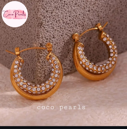 Coco pearls stainless Steel anti tarnish pair of gold crescent-shaped hoop earrings adorned with clear rhinestones