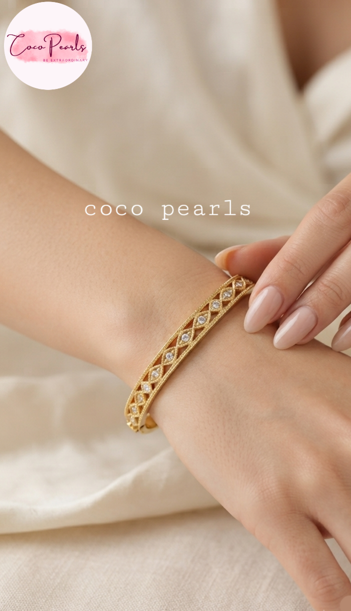 Coco pearls stainless Steel anti tarnish filligree handcuff displayed on hand