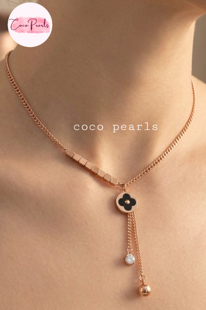 coco pearls stainless steel anti tarnish waterproof Fortune Clover Charm Necklace displayed on neck