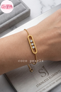 Coco pearls stainless Steel anti tarnish gold gleam Track Bracelet displayed on simple background 