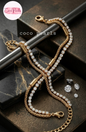 Coco Pearls Stainless steel Anti Tarnish Golden stream link bracelet with double layer chain. a diamond studded line and golden chain displayed a white background