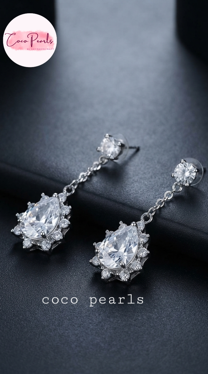 Coco pearls diamond studded zircon earrings displayed on simple background 