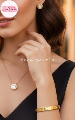 Coco Pearls Stainless Steel Anti Tarnish Gold milestone jewelry set including necklace, earrings, and handcuff bracelet women wearing it