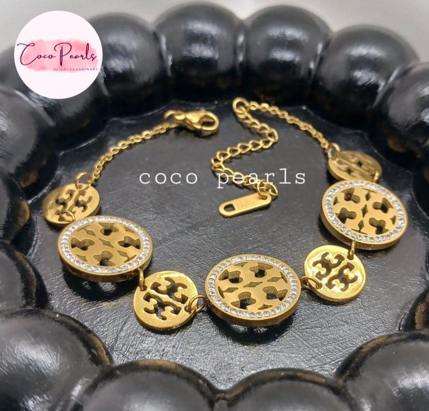 Coco Pearls Stainless steel anti tarnish Gold sparkly vibe bracelet  with circular diamond studded intricate designs