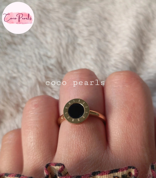 Coco pearls stainless Steel anti tarnish black center ring with roman numerals displayed on hand