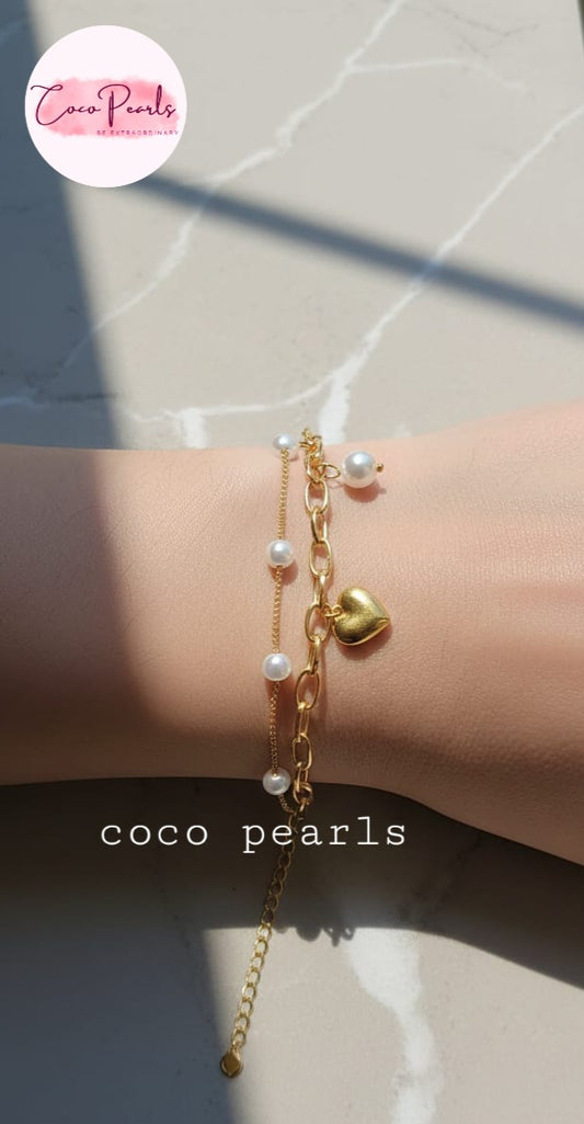Coco Peals Stainless Steel anti  tarnish Gold morning dew chain bracelet with heart charm and pearls on a hand