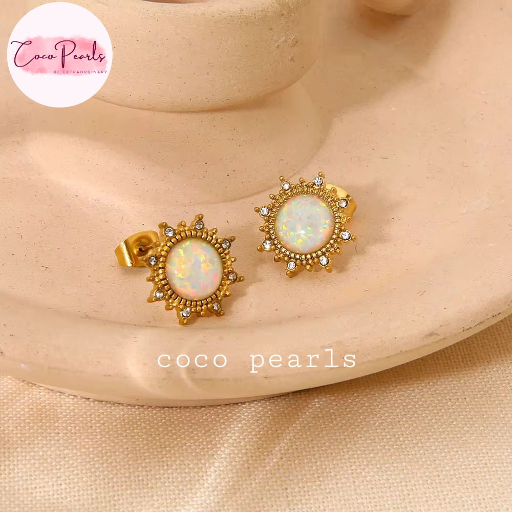 Coco pearls stainless Steel anti tarnish gold opal set displayed on simple background 