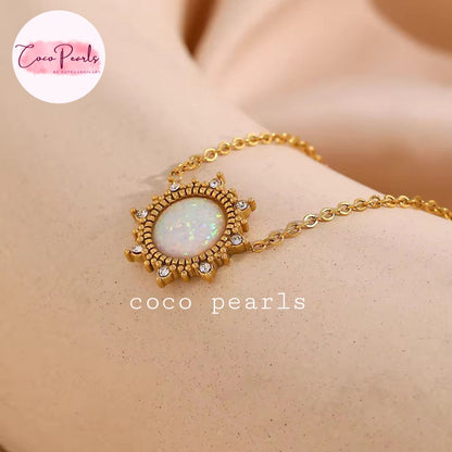 Coco pearls stainless Steel anti tarnish gold opal Neclace displayed on simple background 