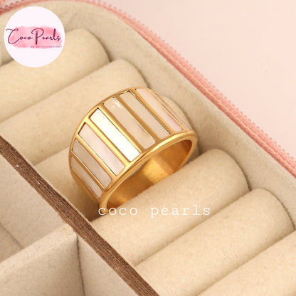 Coco pearls stainless Steel anti tarnish gold ring with vertical white pearl inlays, displayed in a beige ring box.