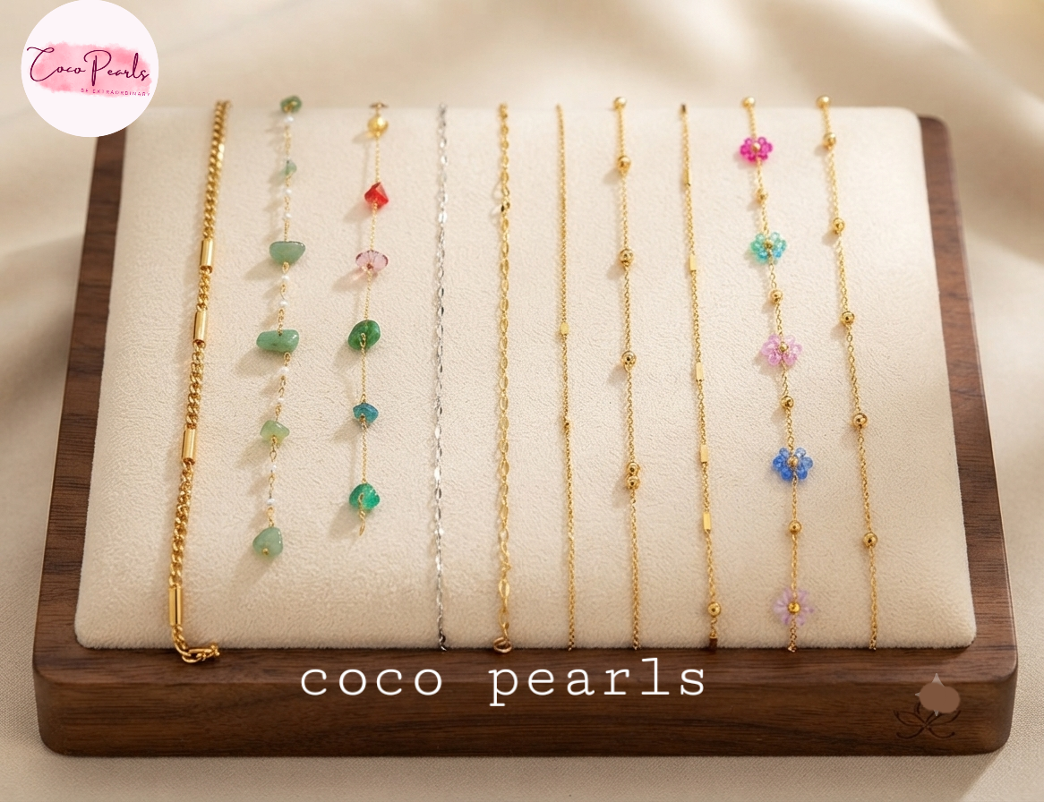 Coco pearls stainless Steel anti tarnish gold  and silver permanent chains on simple background 