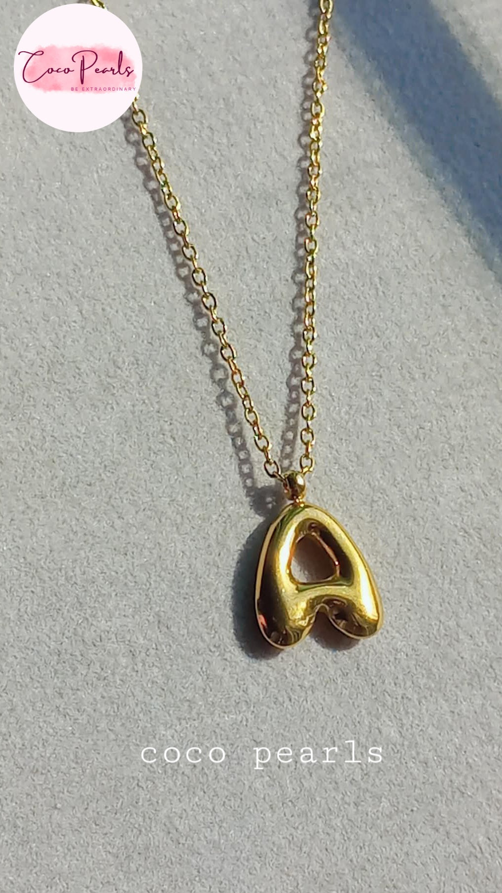 Coco pearls stainless Steel anti tarnish gold initial necklace featuring the letter 'A' pendant on a delicate gold chain