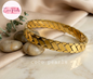 Coco pearls stainless Steel anti tarnish gold  grid handcuff displayed on simple background 