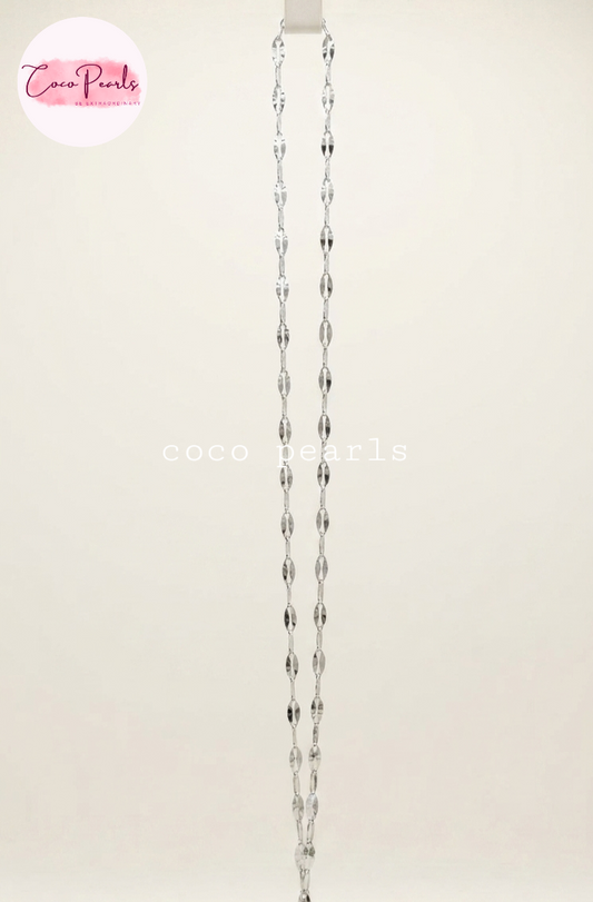Coco Pearls stainless Steel anti tarnish silver rice chain displayed on simple background 