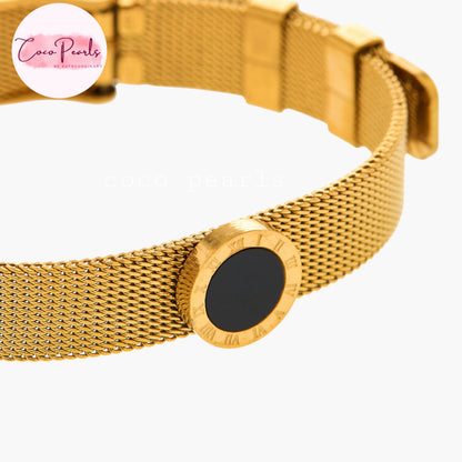 Coco pearls stainless Steel anti tarnish gold roman chain bracelet displayed on simple background 