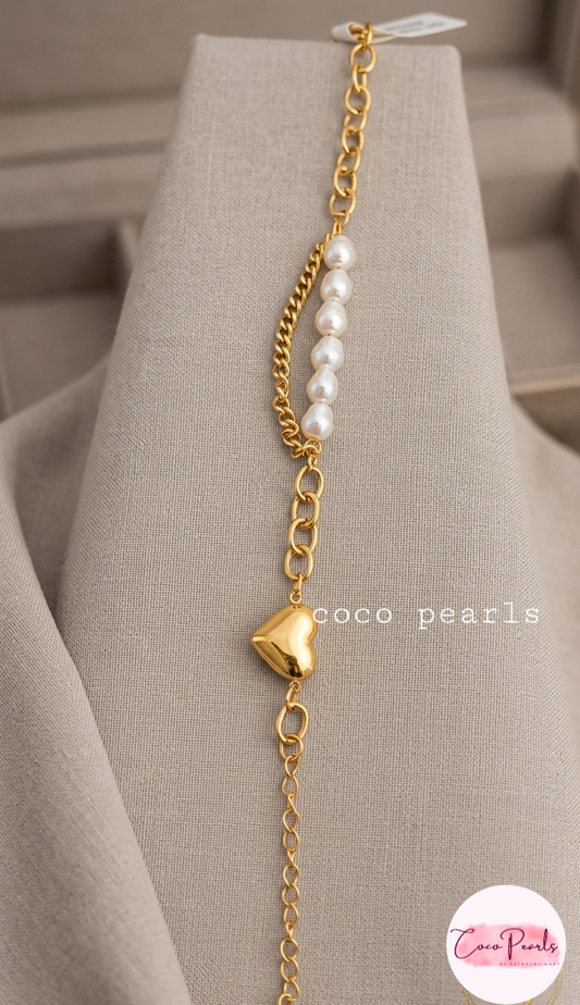 Coco pearls stainless Steel anti tarnish gold  bracelet displayed on simple background 