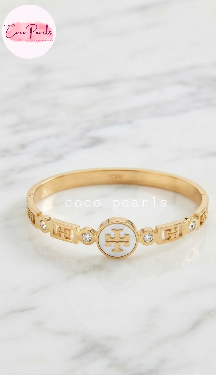 Coco pearls stainless Steel anti tarnish gold handcuff with logo in center 