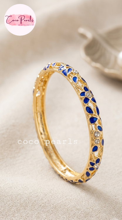 Coco pearls gold-plated bangle bracelet with blue enamel floral patterns and small clear rhinestones