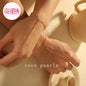 Coco pearls stainless Steel anti tarnish gold small ball hand harness displayed on hand 