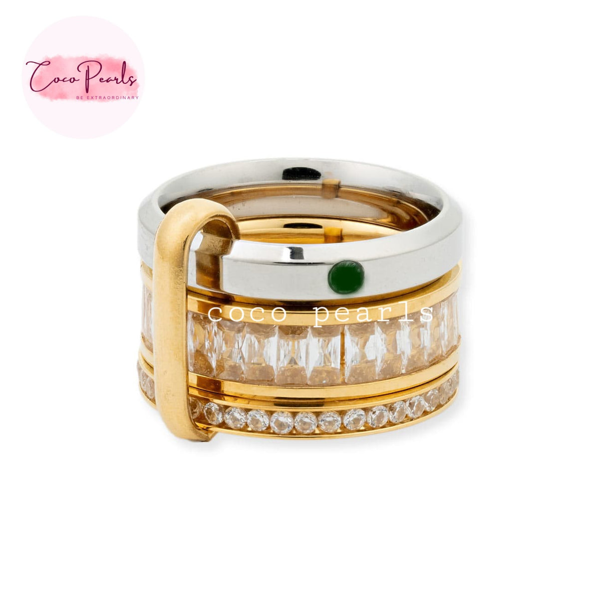 Coco pearls stainless Steel anti tarnish multi-band ring by Coco Pearls featuring gold and silver bands, clear baguette-cut crystals, a small green gemstone, and a gold loop closure, shown on a white background