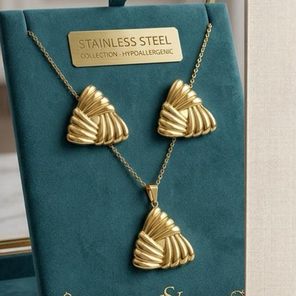 Coco pearls stainless Steel anti tarnish Gold jewelry set with gold trinity design with necklaces and earrings on a white background
