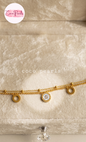 Coco pearls stainless Steel anti tarnish gold  triple Circle Charm Bracelet with triple coin circles displayed on simple background 